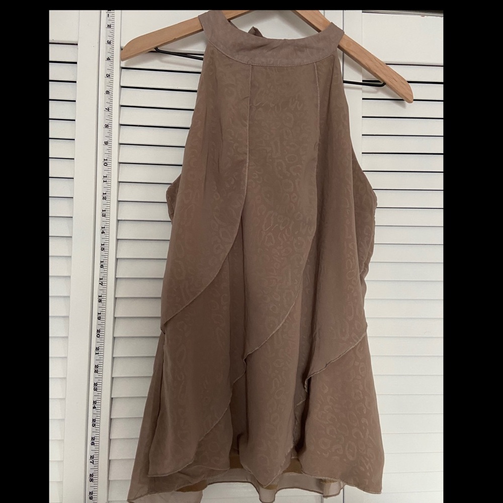 Woman’s cheetah print top